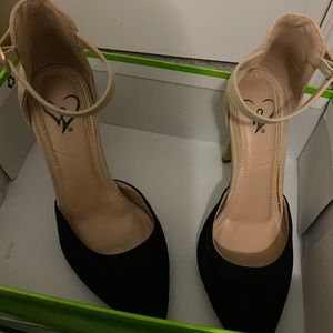 Cream and black heels